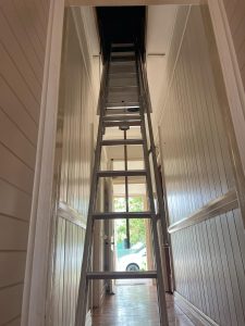 attic ladder installation in Logan home